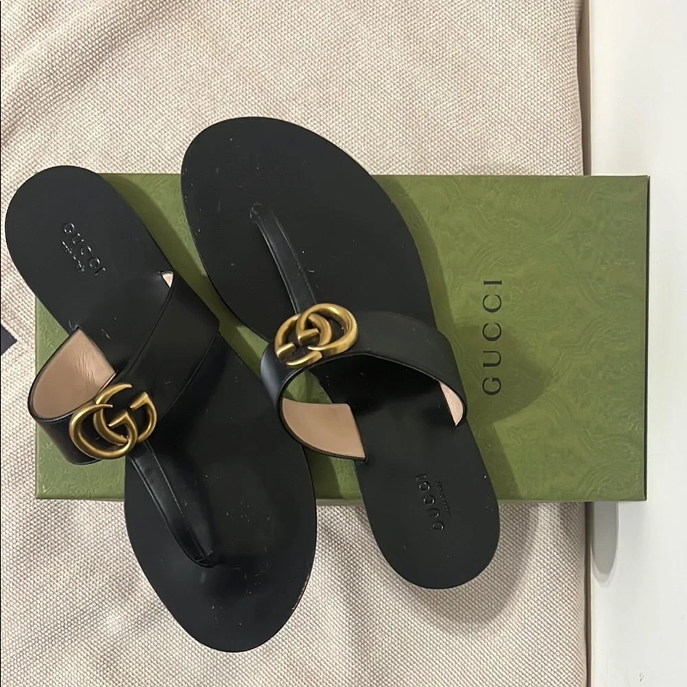Gucci Black Leather Thong Sandals with Gold GG Buckle